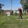Michael playing the first hole of the Nullarbor Links at Ceduna
